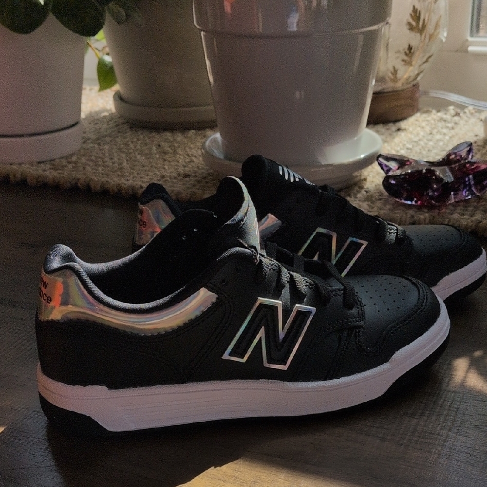 New Balance Black Sneakers with Iridescent Heel and Logo